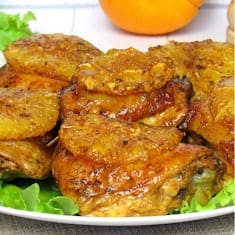 Куриные бедра в духовке с апельсинами